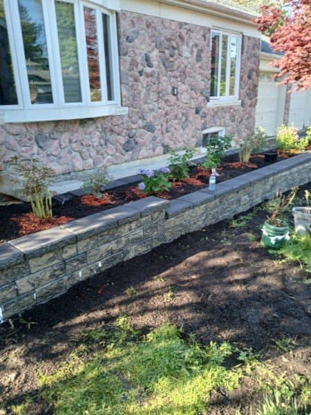 HM Landscaping project photo — After Retaining Wall Planting